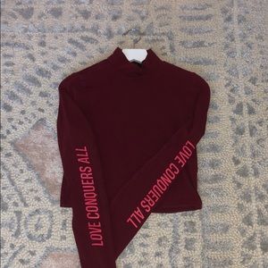 love conquers all cropped mock neck top